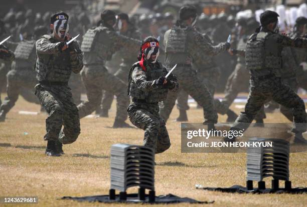 This picture taken on September 29, 2022 and released on October 1, 2022 shows South Korean Army soldiers participating on media day for the 74th...