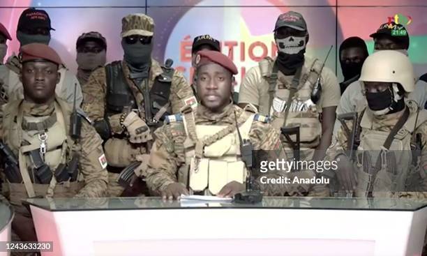 Screen grab shows from state TV, army Capt. Kiswendsida Farouk Azaria Sorgho reads a statement in Ougadougou, Burkina Faso, on Sept. 30, 2022....