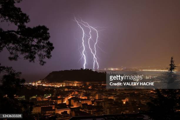 Lightning strikes over the French Riviera city of Nice, Southerneast France, on late Septembe 30, 2022.