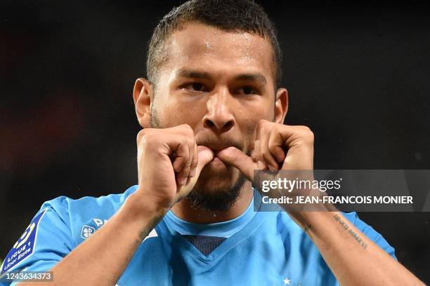 Marseille's Colombian forward Luis Suarez celebrates scoring his team's second goal during the French L1 football match between SCO Angers and...