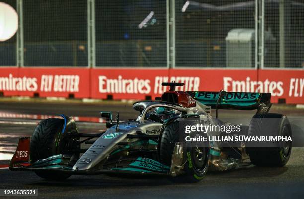 Mercedes' British driver George Russell drives during a practice session ahead of the Formula One Singapore Grand Prix night race at the Marina Bay...