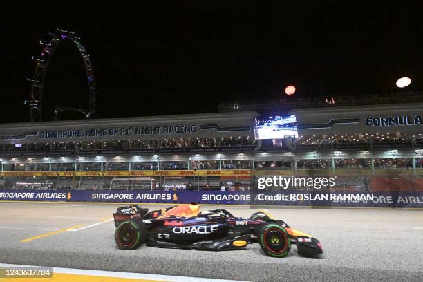 Red Bull Racing's Dutch driver Max Verstappen drives during the qualifying session ahead of the Formula One Singapore Grand Prix night race at the...