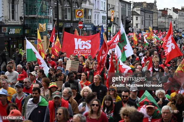 Protestors march through the city centre during a march in support of Welsh Independence on October 1, 2022 in Cardiff, Wales. A recent YouGov poll...