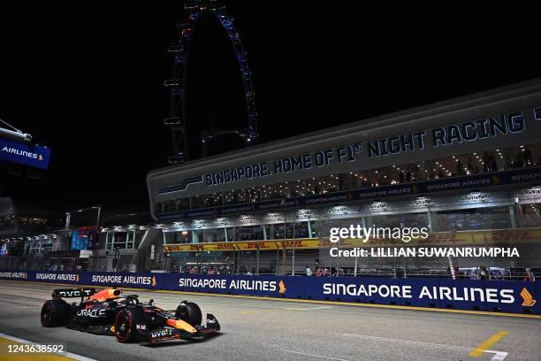 Red Bull Racing's Dutch driver Max Verstappen drives during the qualifying session ahead of the Formula One Singapore Grand Prix night race at the...