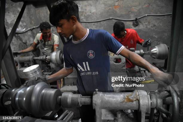 Workers from all ages work inside a aluminium factory at a low income area in Dhaka , Bangladesh on September 30, 2022. Bangladesh made moderate...