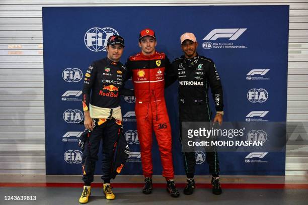 Red Bull Racing's Mexican driver Sergio Perez, Ferrari's Monegasque driver Charles Leclerc and Mercedes' British driver Lewis Hamilton pose for a...