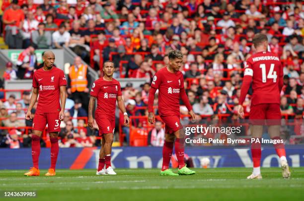 Liverpool players dejected after Brighton and Hove Albion's Leandro Trossard scores their side's second goal of the game during the Premier League...