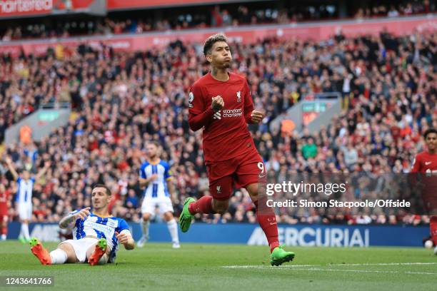 Roberto Firmino of Liverpool celebrates after scoring their 1st goal during the Premier League match between Liverpool FC and Brighton & Hove Albion...