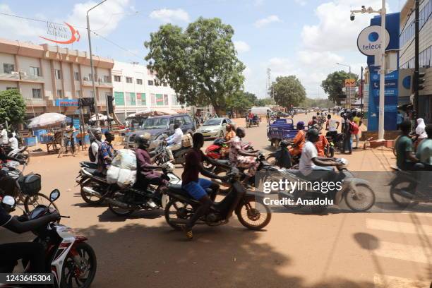 People rush home after Burkina Faso Army seizes power for the second time in a year on October 01, 2022 in Ouagadougou, Burkina Faso.