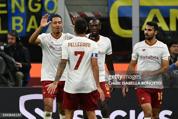 Roma's British defender Chris Smalling celebrates after scoring during the Italian Serie A football match between Inter and AS Roma on October 1,...