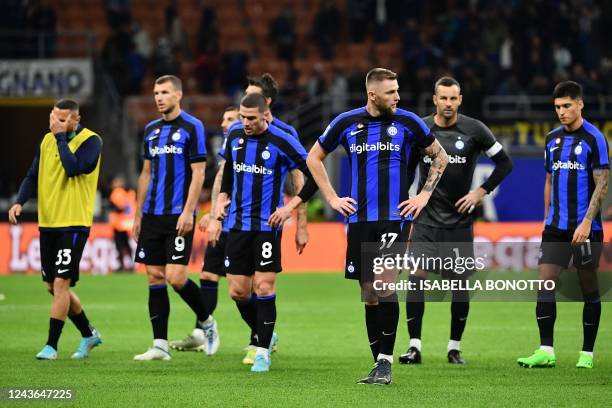 Inter Milan's Slovakian defender Milan Skriniar and teammates react at the end of the Italian Serie A football match between Inter and AS Roma on...