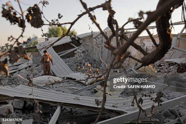 Kurdish man walks amidst the rubble in a school following Iranian cross-border attacks in the town of Koye , 100Km east of Arbil, the capital of the...