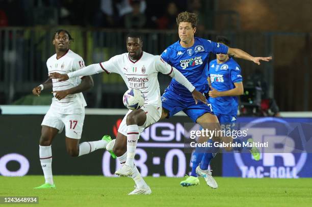 Fodé Ballo-Touré of AC Milan in action against Sam Lammers of Empoli FC during the Serie A match between Empoli FC and AC MIlan at Stadio Carlo...