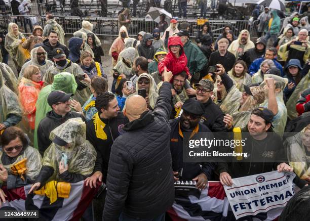 John Fetterman, lieutenant governor of Pennsylvania and Democratic senate candidate, center, greets supporters during a campaign rally in Pittsburgh,...