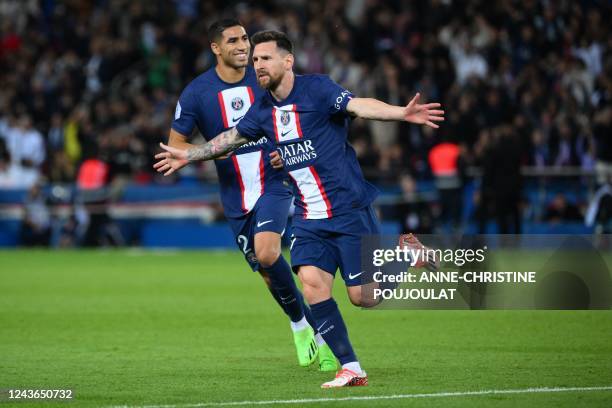 Paris Saint-Germain's Argentine forward Lionel Messi celebrates after scoring during the French L1 football match between Paris Saint-Germain and OGC...