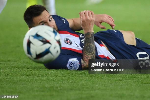 Paris Saint-Germain's Argentine forward Lionel Messi eyes the ball during the French L1 football match between Paris Saint-Germain and OGC Nice at...