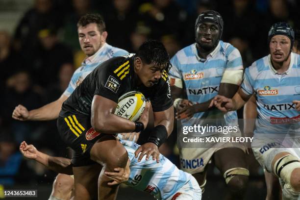 La Rochelle's Australian lock Will Skelton is tackled during the French Top14 rugby union match between Stade Rochelais and Racing 92 at The...