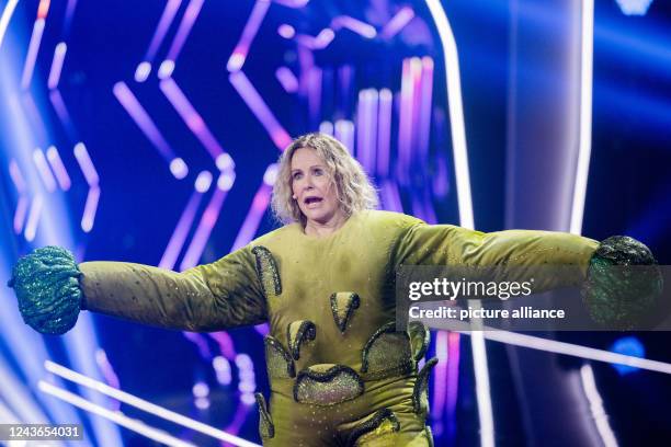 October 2022, North Rhine-Westphalia, Cologne: Katja Burkard, presenter, is on stage as the character "Der Brokkoli" in the Prosieben show "The...