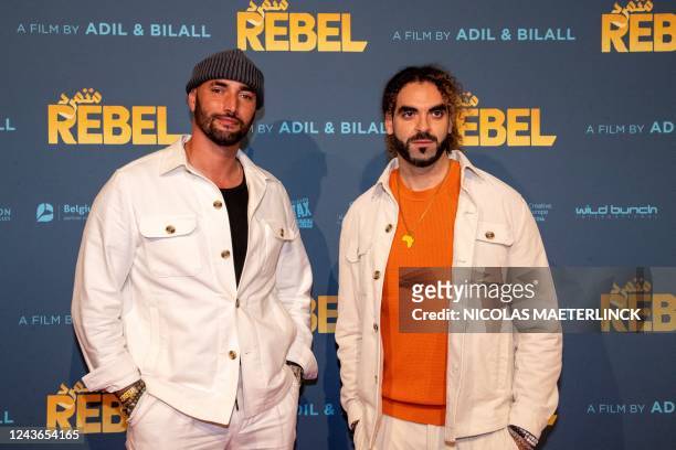 Belgian film directors Bilall Fallah and Adil El Arbi pose at the premiere of the film 'Rebel', at the Kinepolis cinema in Brussels on October 1,...