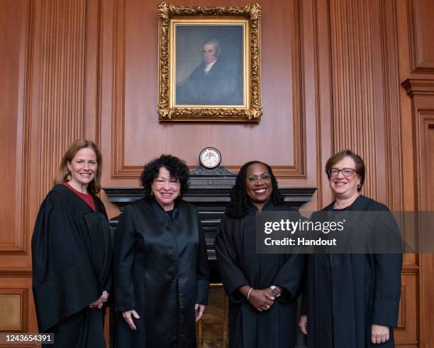 In this handout provided by the Collection of the Supreme Court of the United States, Associate Justices Amy Coney Barrett, Sonia Sotomayor, Ketanji...