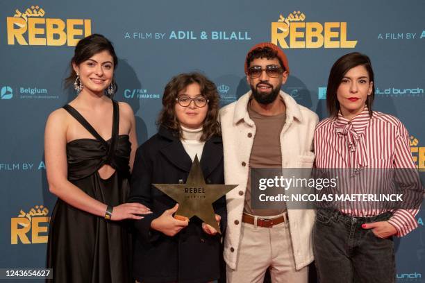 Belgian actor Aboubakr Bensaihi and Belgian actress Lubna Azabal pose at the premiere of the film 'Rebel', at the Kinepolis cinema in Brussels on...