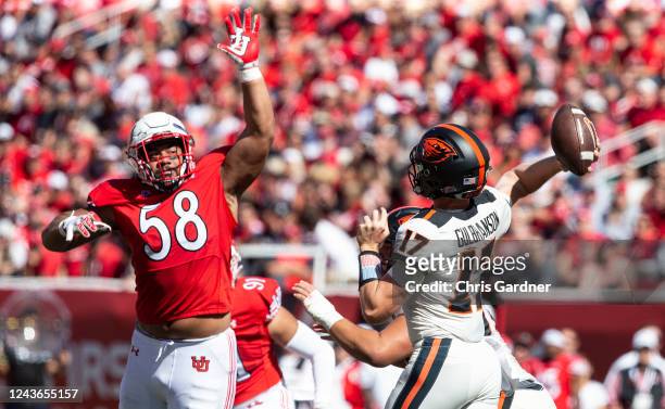 Junior Tafuna of the Utah Utes pressures Ben Gulbranson of the Oregon State Beavers during the first half of their game October 1, 2022 at...
