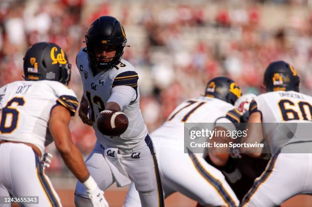 California Golden Bears quarterback Jack Plummer hands the ball off to California Golden Bears running back Jaydn Ott during the game between the...