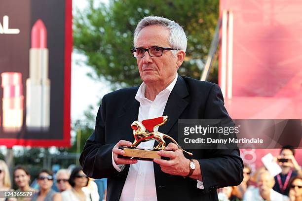 Gold Lion Lifetime Achievement winner Marco Bellocchio holds his award after the Gold Lion Lifetime Achievement Awards during The 68th Venice...