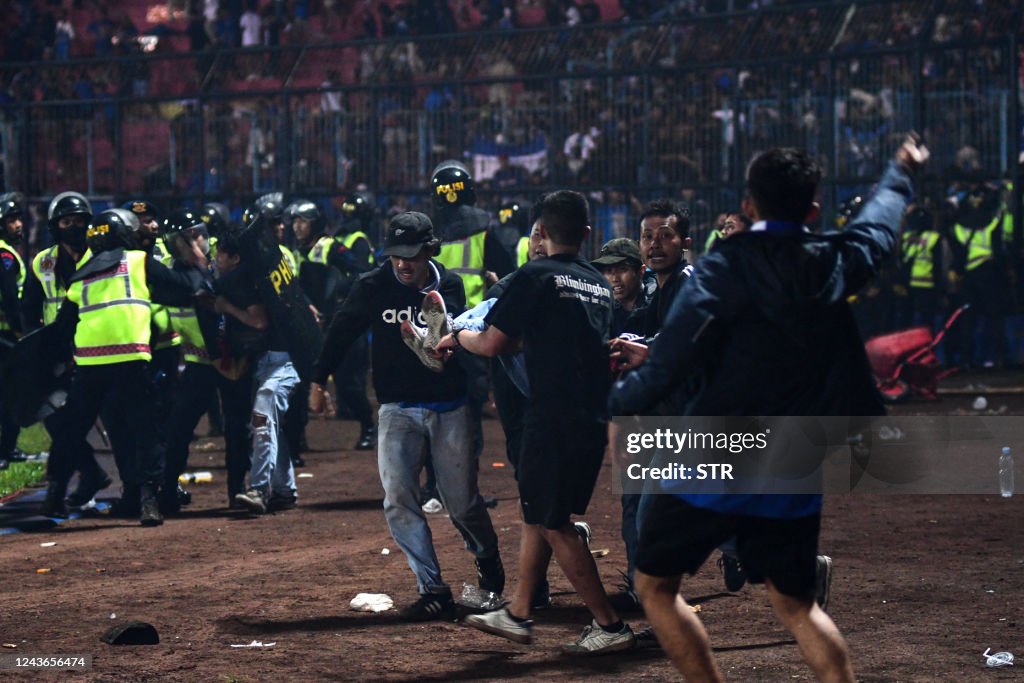TOPSHOT-INDONESIA-FBL-UNREST-STAMPEDE