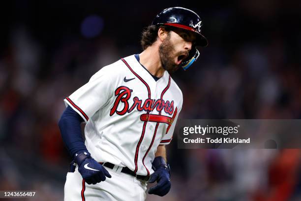 Dansby Swanson of the Atlanta Braves reacts after hitting a two run home run during the fifth inning against the New York Mets at Truist Park on...