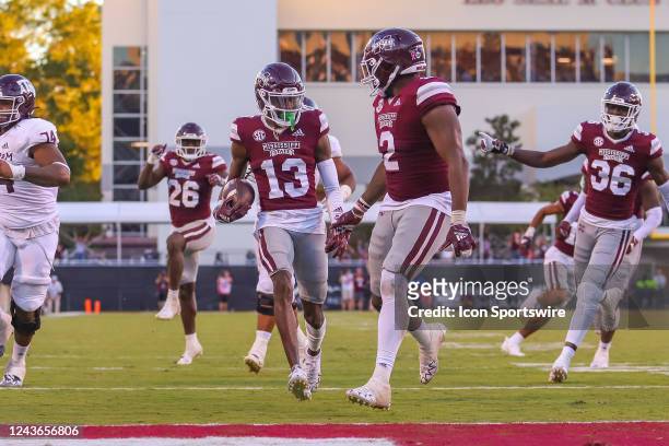 Mississippi State Bulldogs cornerback Emmanuel Forbes returns an interception for a touchdown during the game between the Mississippi State Bulldogs...