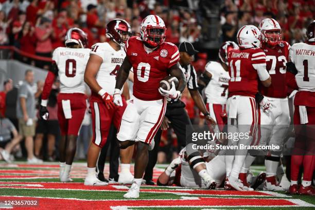 Running back Jaquez Yant of the Nebraska Cornhuskers scores on a run against the Indiana Hoosiers in the second quarter at Memorial Stadium on...