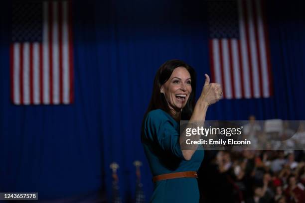 Republican gubernatorial candidate Tudor Dixon gives a thumbs up during a Save America rally on October 1, 2022 in Warren, Michigan. Trump has...