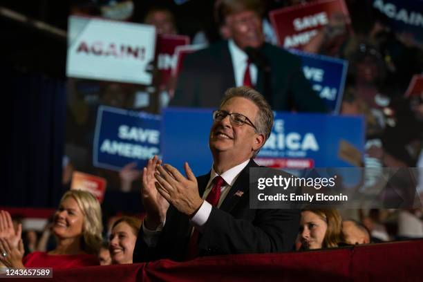 Republican candidate for Attorney General Matthew DePerno claps during former President Donald Trump's remarks during a Save America rally on October...