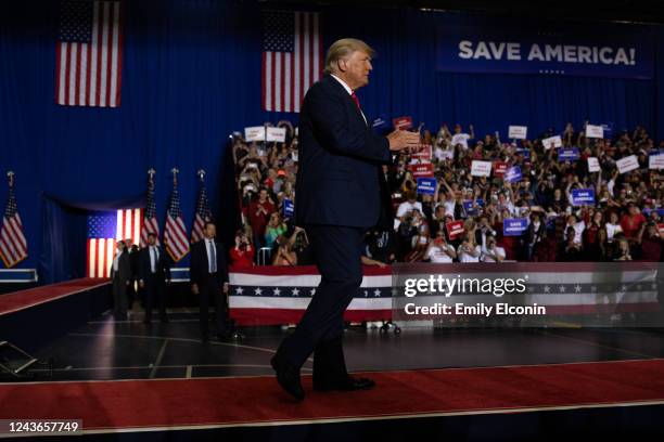 Former President Donald Trump makes his way across stage before addressing the crowd during a Save America rally on October 1, 2022 in Warren,...