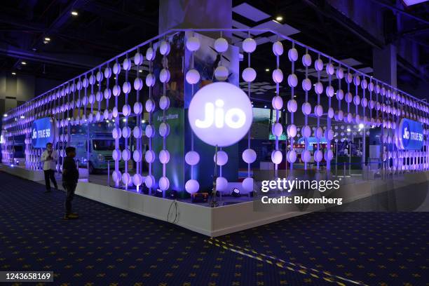 Visitors at the Reliance Jio Infocomm Ltd. Booth at India Mobile Congress 2022 exhibition in New Delhi, India, on Saturday, Oct. 1, 2022. Narendra...
