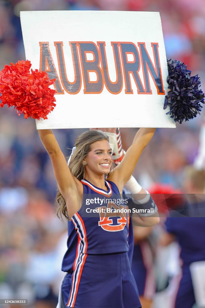 Reese Rutledge A University of Auburn cheerleader fires up the home crowd before ...
