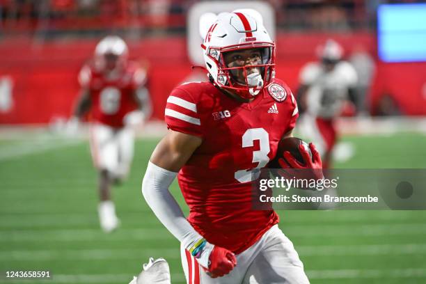 Trey Palmer of the Nebraska Cornhuskers scores on a pass play against the Indiana Hoosiers in the fourth quarter of the game at Memorial Stadium on...