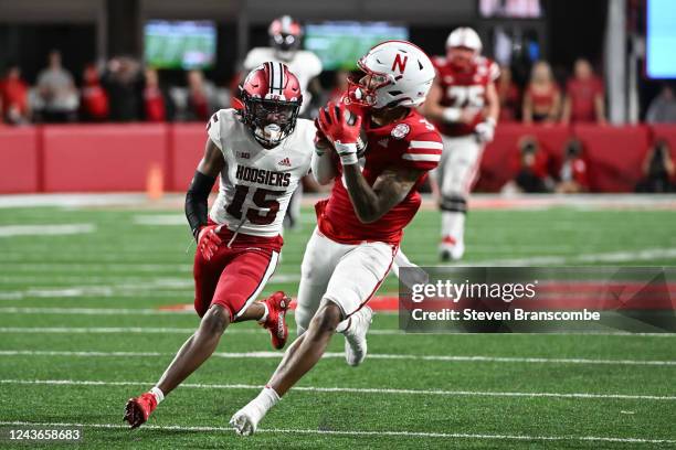 Trey Palmer of the Nebraska Cornhuskers catches a touchdown pass against Phillip Dunnam of the Indiana Hoosiers in the fourth quarter of the game at...