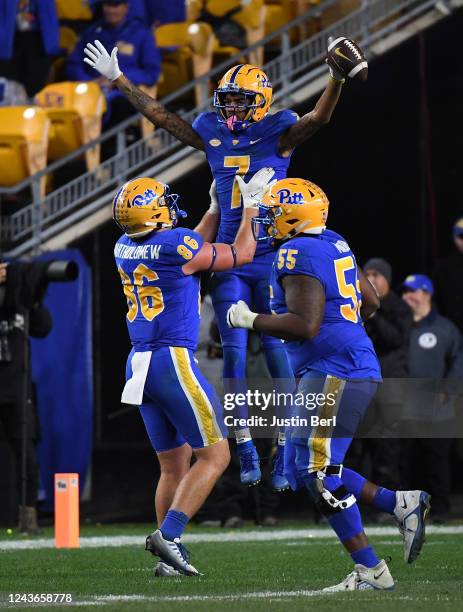 Jaden Bradley of the Pittsburgh Panthers celebrates with Gavin Bartholomew after a 26-yard touchdown reception in the fourth quarter during the game...