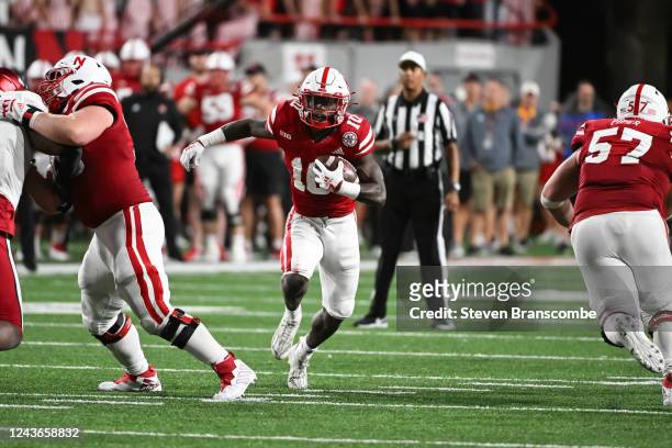 Anthony Grant of the Nebraska Cornhuskers runs through a hole against the Indiana Hoosiers in the fourth quarter of the game at Memorial Stadium on...