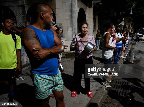 People protest the lack of power in the aftermath Hurricane Ian in Havana, on September 1, 2022. - Electricity knocked out by Hurricane Ian was...