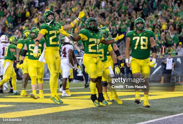 Running back Jordan James of the Oregon Ducks celebrities his touchdown against the Stanford Cardinal during the first half at Autzen Stadium on...