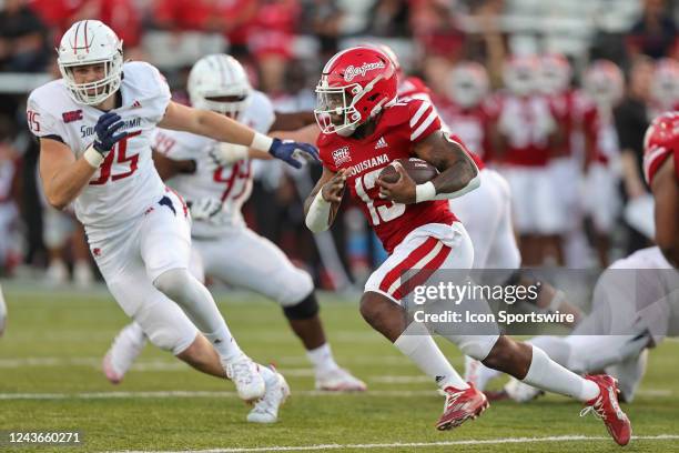 Louisiana-Lafayette Ragin Cajuns running back Chris Smith tries to turn the corner during a college football game between the Louisiana Ragin Cajuns...