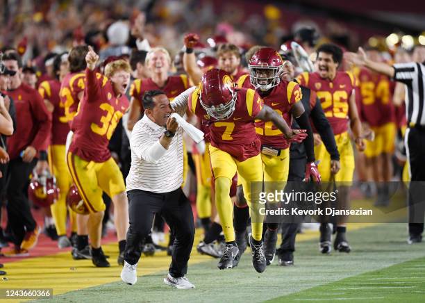 Calen Bullock of the USC Trojans celebrates after intercepting a pass thrown by quarterback Emory Jones of the Arizona State Sun Devils during the...