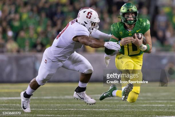 Stanford Cardinal defensive end Aeneas DiCosmo attempts to tackle Oregon Ducks quarterback Bo Nix during the college football game between the...