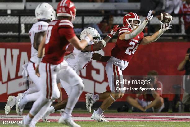 Louisiana-Lafayette Ragin Cajuns tight end Pearse Migl catches a touchdown pass late in the fourth quarter during a college football game between the...