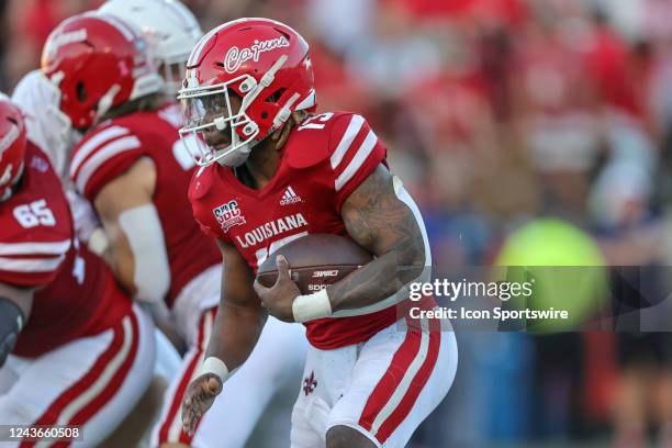 Louisiana-Lafayette Ragin Cajuns running back Chris Smith runs the ball during a college football game between the Louisiana Ragin Cajuns and the...