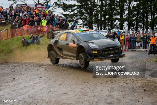 Italy's Lorenzo Bertelli and co-driver Simone Scattolin drive their Ford Puma Rally 1 Hybrid during SS17 during the Rally New Zealand, the 11th round...