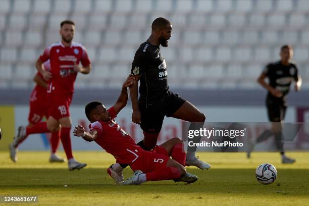 Aytron Davidy Meghon Valpoort of Santa Lucia moves with the ball away from his marker Andre Prates of Gudja United during the Malta BOV Premier...